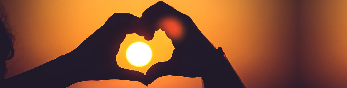 turtlelodgehealing.co.uk image: someone making a heart shape with their hands